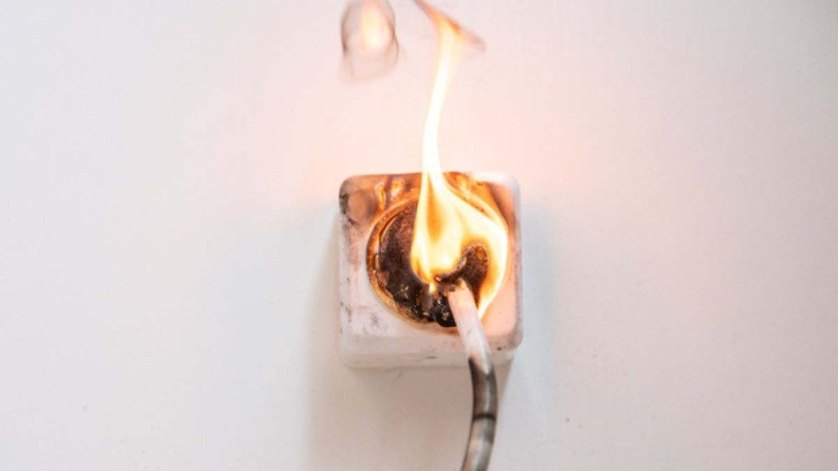What are the holes in the pins of electrical plugs for?